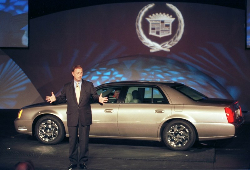 2000_DeVille_DTS_03.jpg - John F. Smith, General Motors vice president and Cadillac general manager, explains the completely redesigned and re-engineered 2000 Cadillac DeVille DTS which made its worldwide debut Tuesday, July 27, 1999, in Rochester, Mich.  It is the 50th anniversary of the DeVille brand.